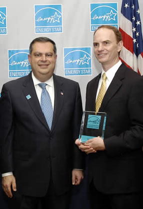 Spencer Cramer receiving EnergyStar award for Service Provider of the year in 2004 from Spencer Abrams